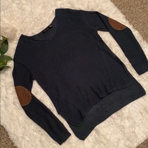 Dark teal sweater with brown elbow patches